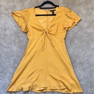 Adorable mustard yellow dress with sewn hearts